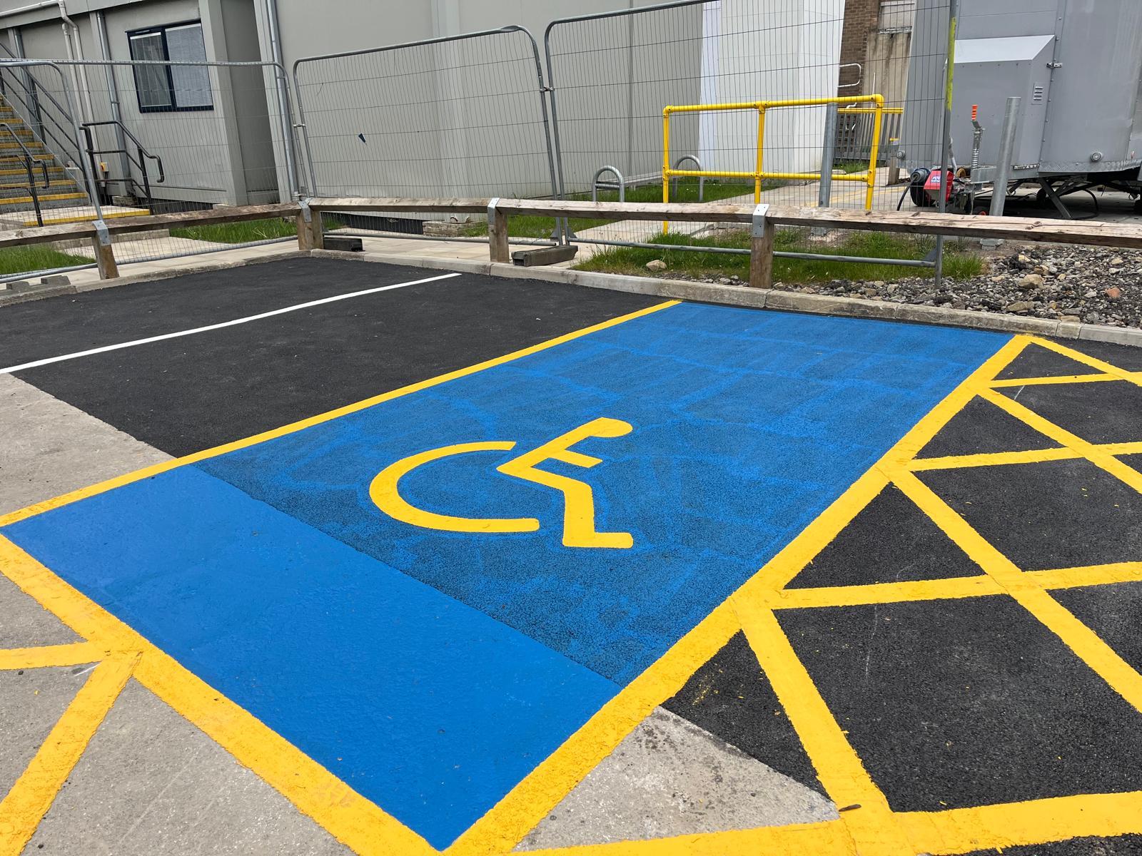 tarmac car park disabled bay blue surfacing yellow line markings Yorkshire